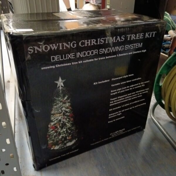 Deluxe snowing Christmas tree kit packaging, vintage holiday decor.
