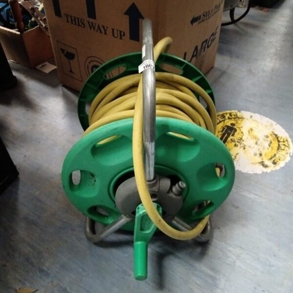 Used Hozelock hose reel for garden watering.