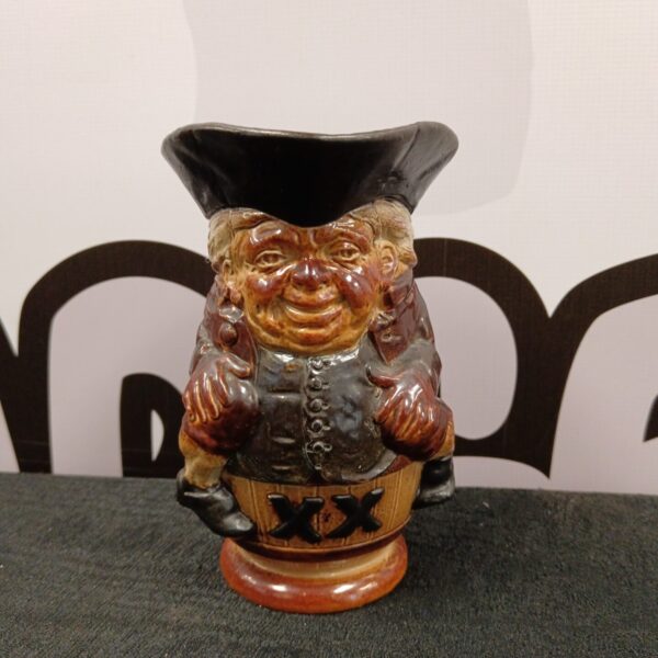 Antique Royal Doulton toby jug with a characterful gentleman design.