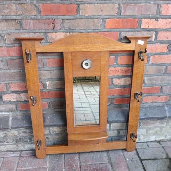 Vintage hall coat rack with mirror and barometer.