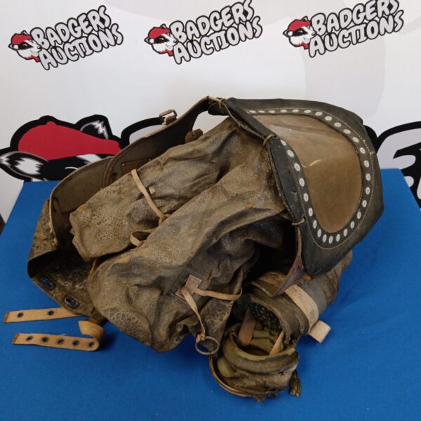 Vintage WW2 baby gas mask with canvas bag.