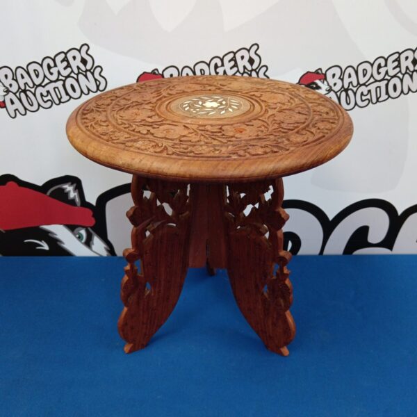 Vintage Anglo Indian occasional table with intricate carved details.