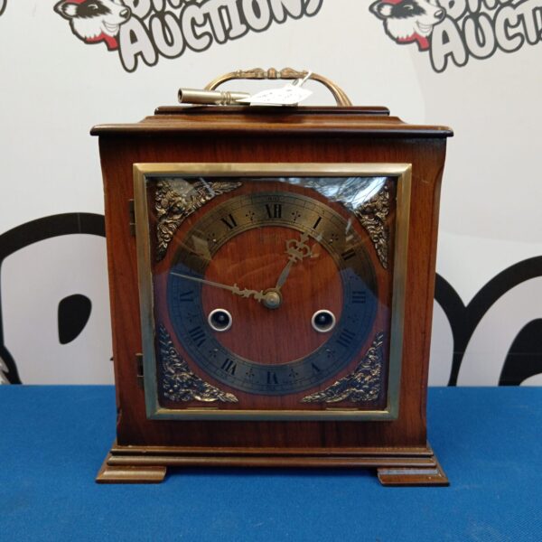 Vintage Smiths Enfield mantle clock from 1944 with wooden case.