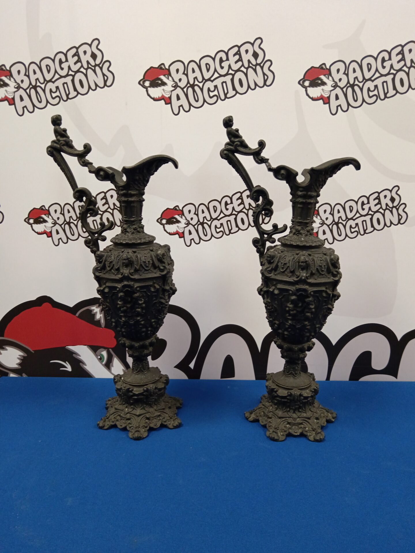 058 Pair of antique cast iron gothic ewers