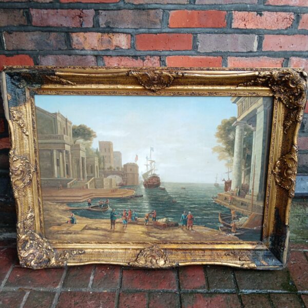 Large gilt framed oil painting of a Mediterranean harbour scene.
