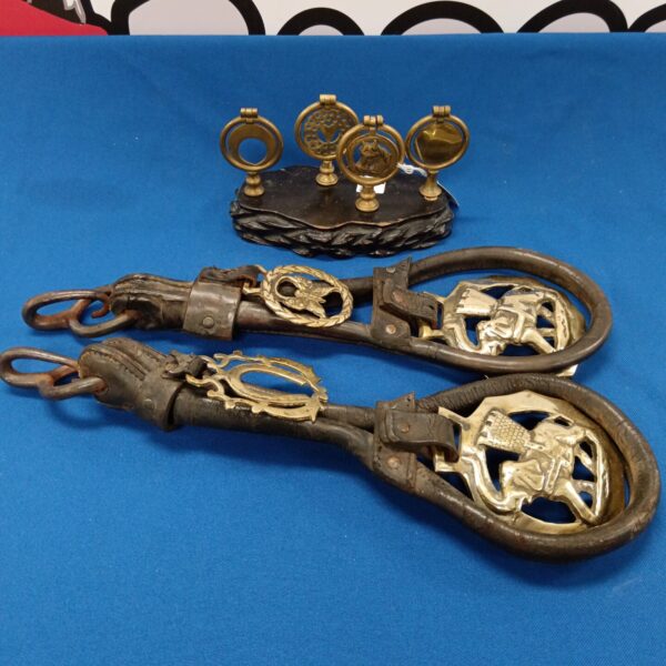 Antique Victorian horse brasses set, detailed equestrian decoration.