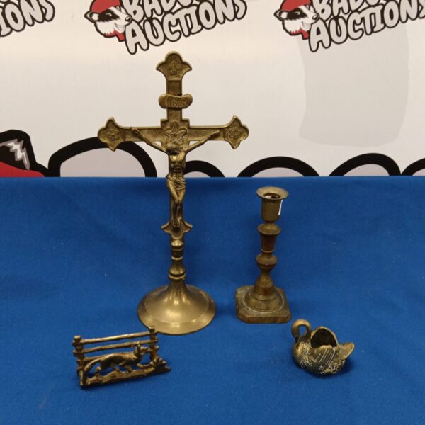 Antique brass crucifix with detailed figure of Christ.