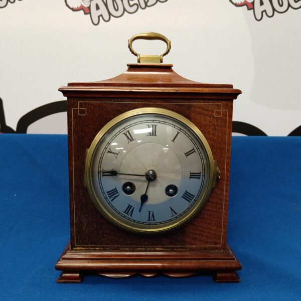 Vintage Japy Freres mantle clock with Roman numeral dial.