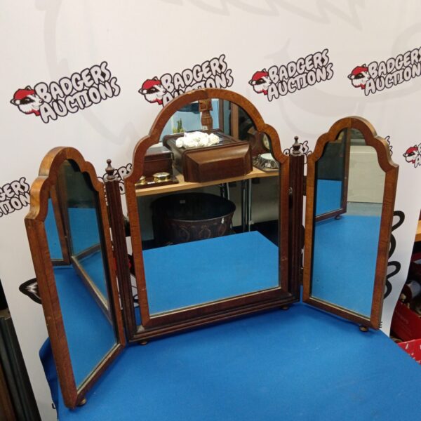 Vintage tri-fold dressing table mirror with wooden frame.
