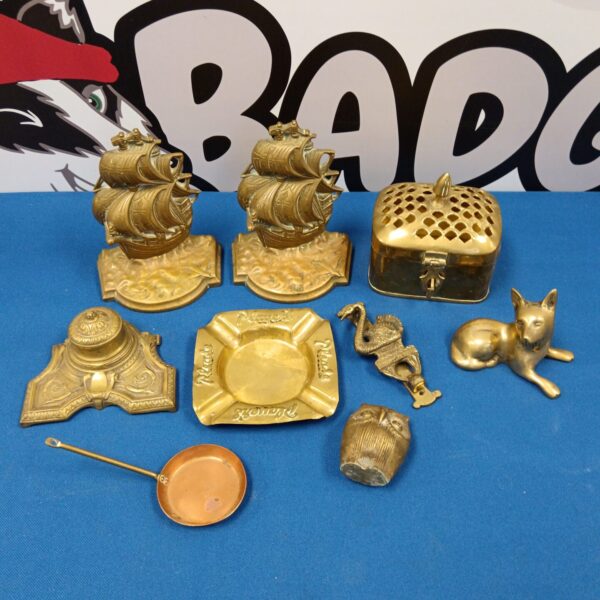Vintage brass ware lot including ship bookends and figurine.