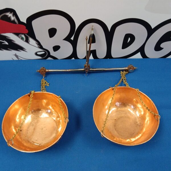 Vintage copper scales set with hanging pans.