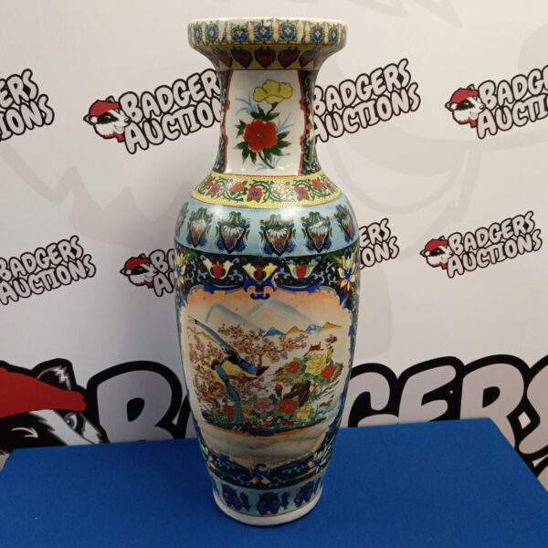Large hand-painted Chinese vase with detailed bird design.