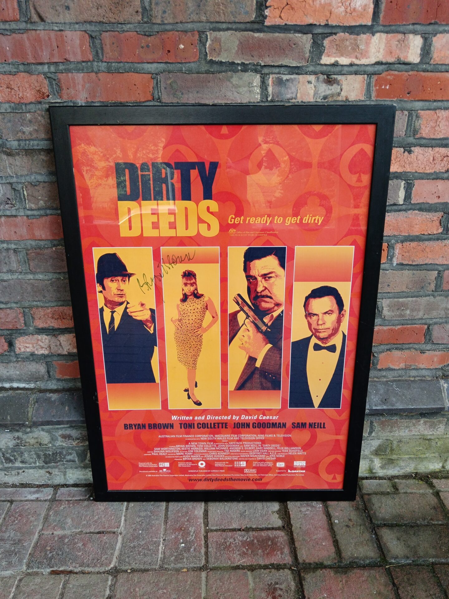 703 Brian brown signed dirty deeds cinema lobby poster