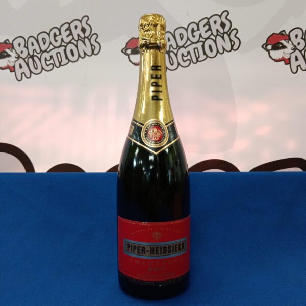 Sealed bottle of Piper Heidsieck Champagne Brut sparkling wine.