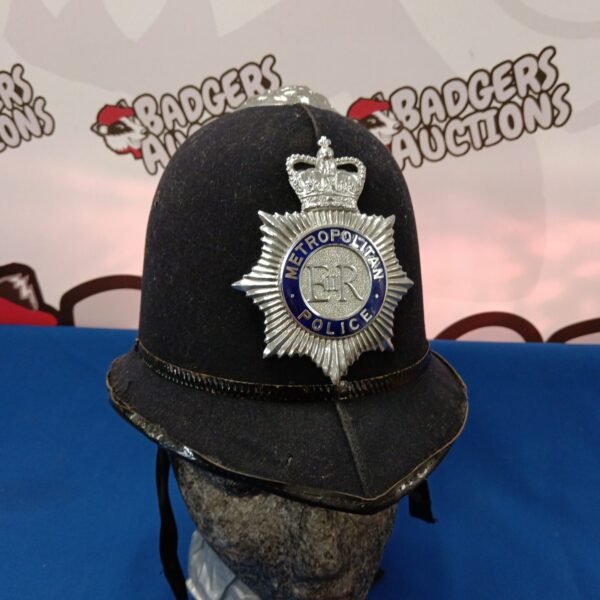 Vintage 1980s Metropolitan Police helmet with crest.