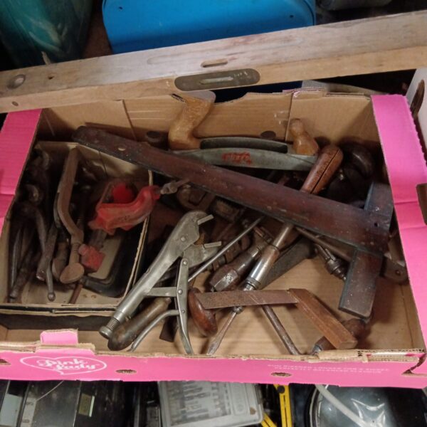 Vintage tool lot with clamps and crimps for workshop use.