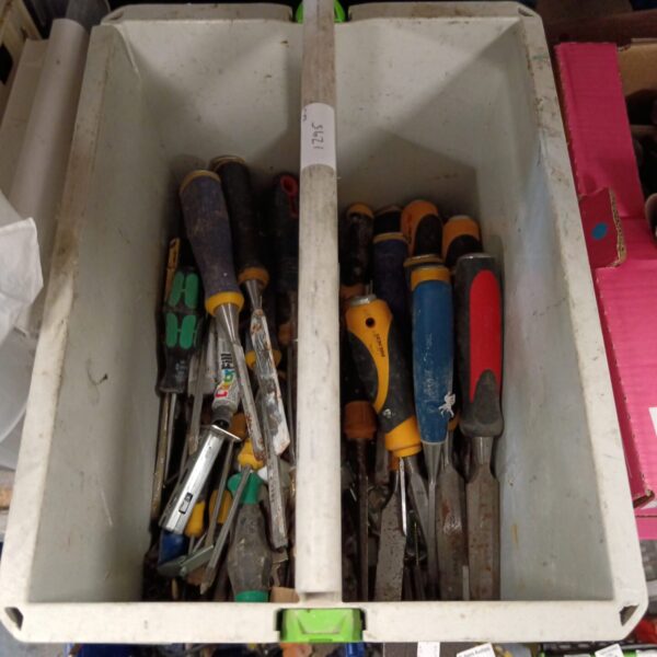 Mixed tool lot featuring various chisels and hand tools.