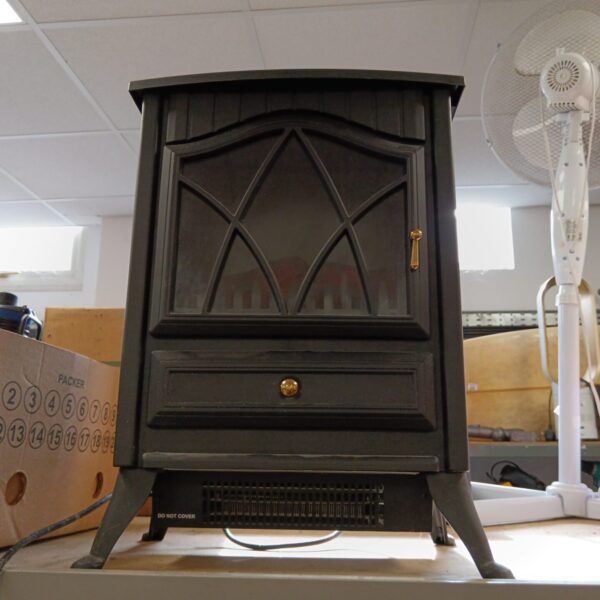 Front view of a vintage electric stove fireplace.