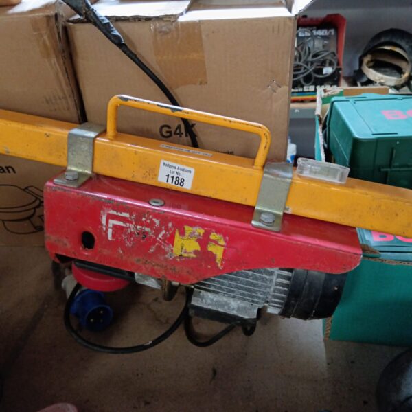 Used electric engine hoist for garage and workshop use.