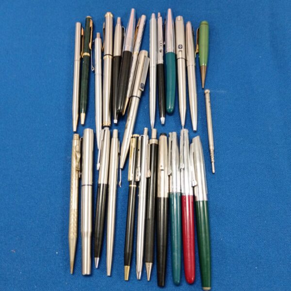 Vintage pen collection featuring Parker pens and classic designs.