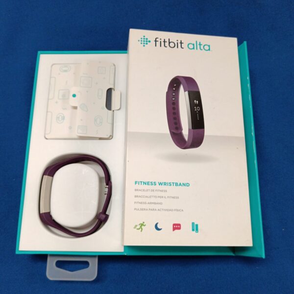 Fitbit Alta fitness tracker in original packaging.