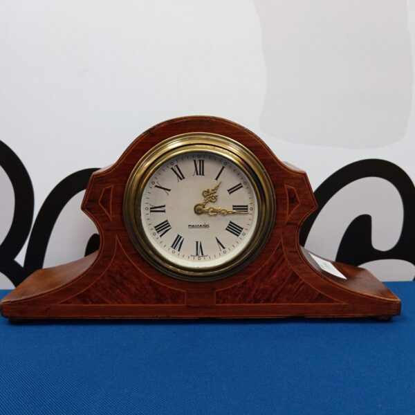 Vintage West German mantle clock with wooden case.