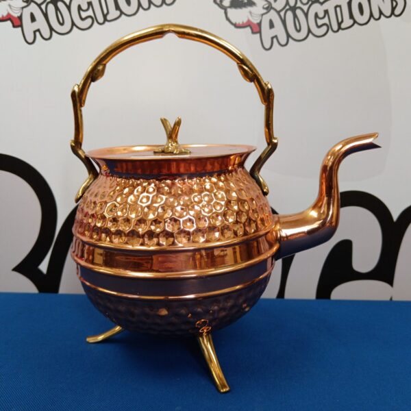 Vintage copper teapot with Japanese style and brass accents.