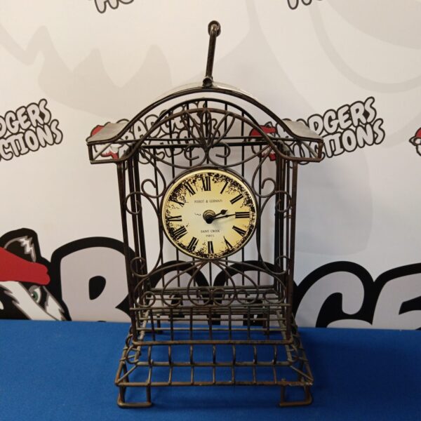 Vintage Poirot & Germain metal framed clock, Saint Croix Paris.
