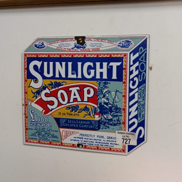 Vintage Sunlight Soap enamel sign with reward offer.