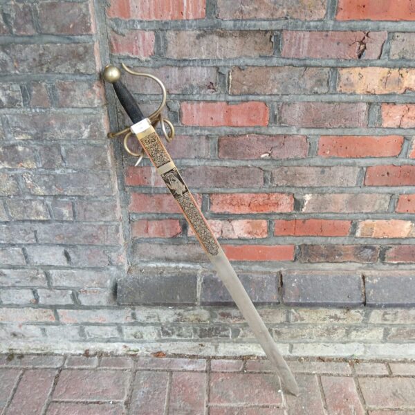 Antique Spanish Colada del Cid sword with ornate hilt.