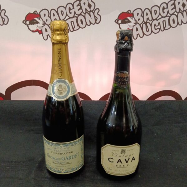 Sealed bottle of vintage George's Gardet Champagne.