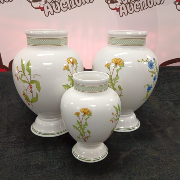 Set of three Villeroy & Boch Eden porcelain vases with floral design.