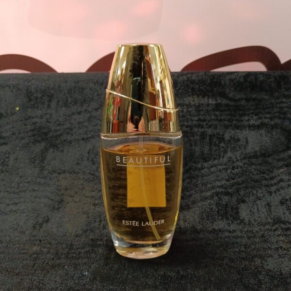 Vintage Estée Lauder Beautiful Eau de Toilette perfume bottle.