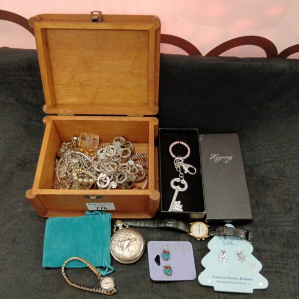 Mixed lot of vintage costume jewellery and watches in a wooden box.