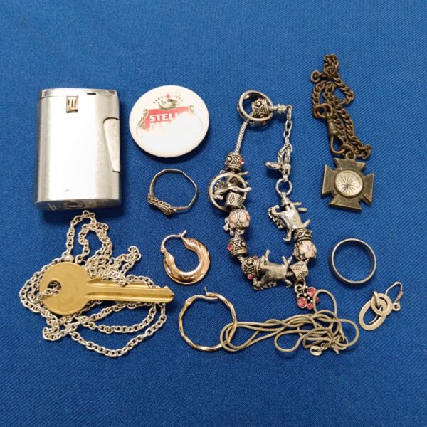 Vintage jewellery and collectibles lot featuring a Ronson lighter and gold earring.