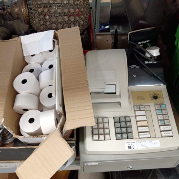 Vintage Sharp ER-A310 cash register with till rolls, a collectible item.