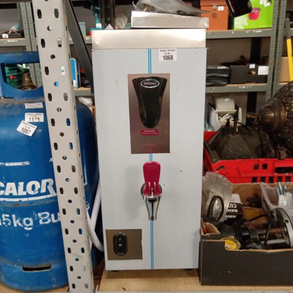 Front view of a stainless steel Instanta boiling water dispenser.