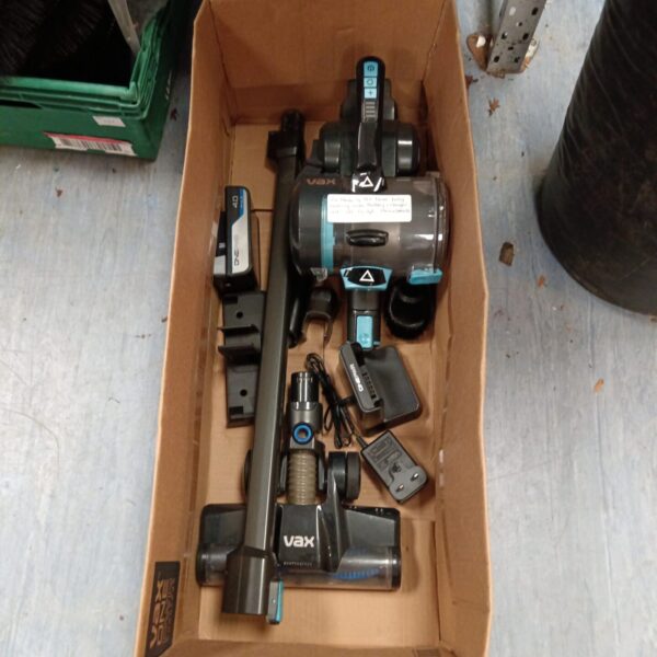 Vax OnePWR cordless vacuum cleaner with charger and accessories.