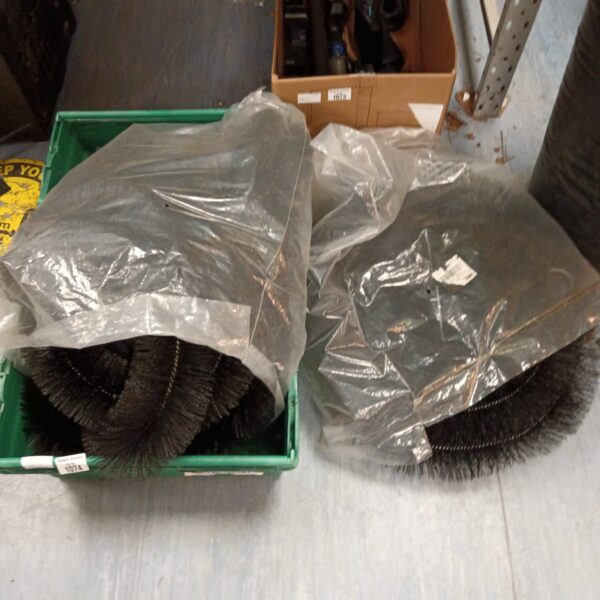 Lot of new hedgehog gutter brushes in packaging.