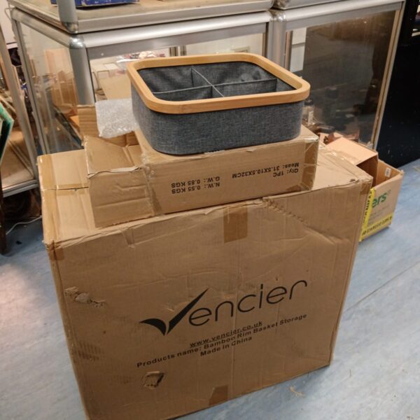 Lot of eleven new Vencier bamboo rim baskets in packaging.