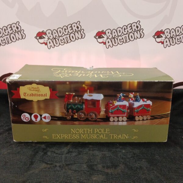 Vintage North Pole Express musical train for holiday decor.