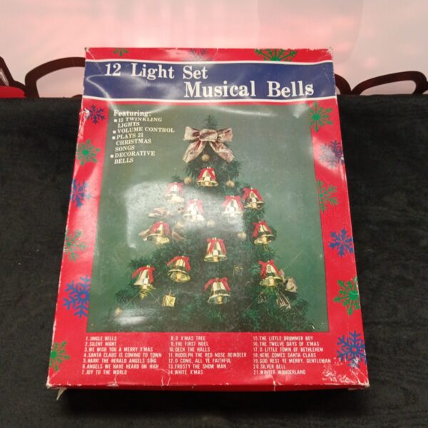 Vintage musical Christmas bell set with twelve lights.