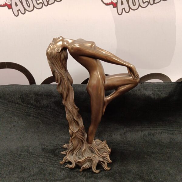 Elegant bronze nude sculpture with art deco style.
