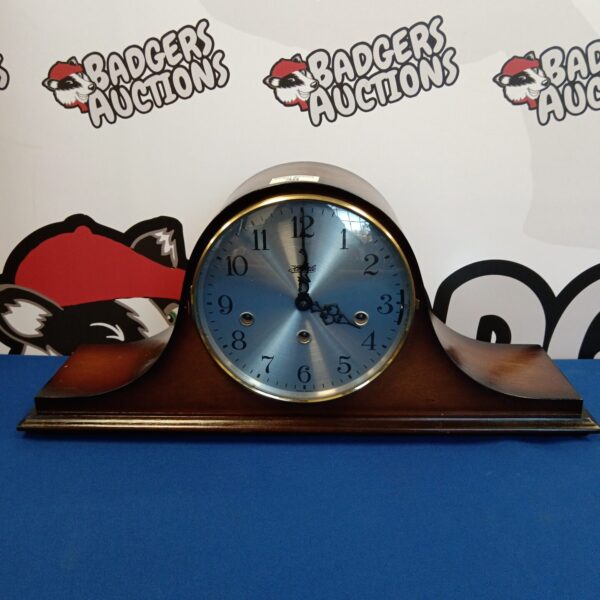 Vintage Hermle mantle clock from the 1930s with wooden case.