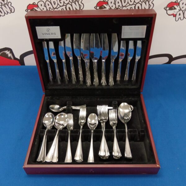 Vintage Viners silver plate cutlery set displayed in its presentation case.