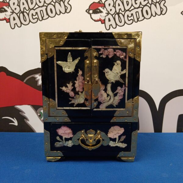 Antique Japanese lacquered jewellery cabinet with mother of pearl inlay.