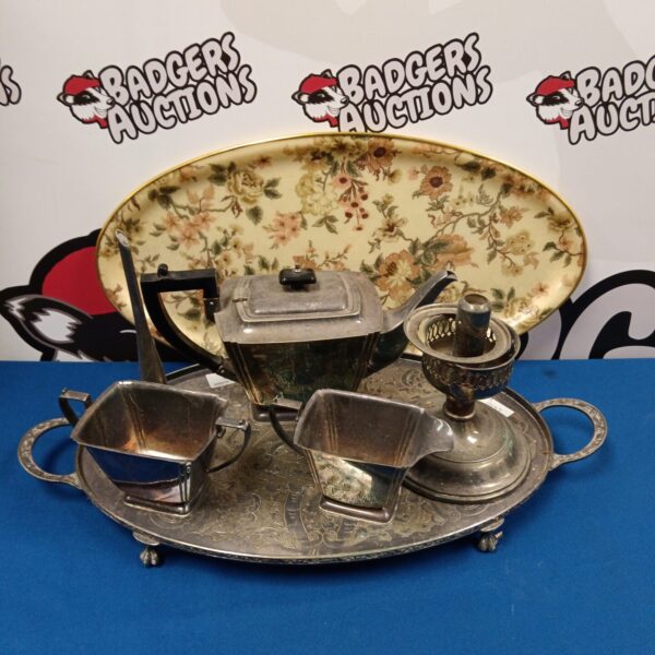 Vintage silver plate serving set with floral tray and teapot.