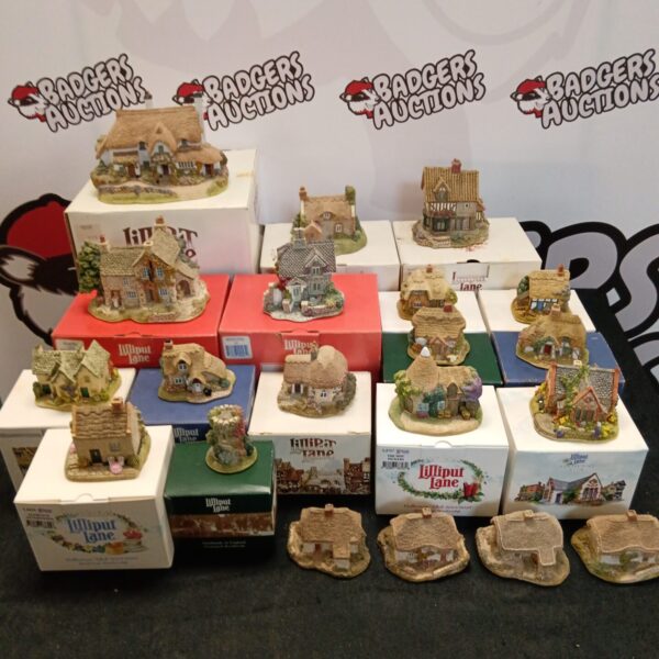 Lilliput Lane cottages collection displayed for sale.
