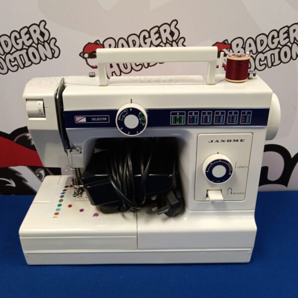 Vintage Janome sewing machine with foot pedal for domestic use.