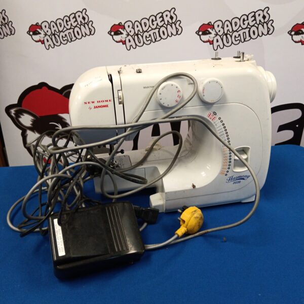 Vintage Janome New Home sewing machine in as-seen condition.